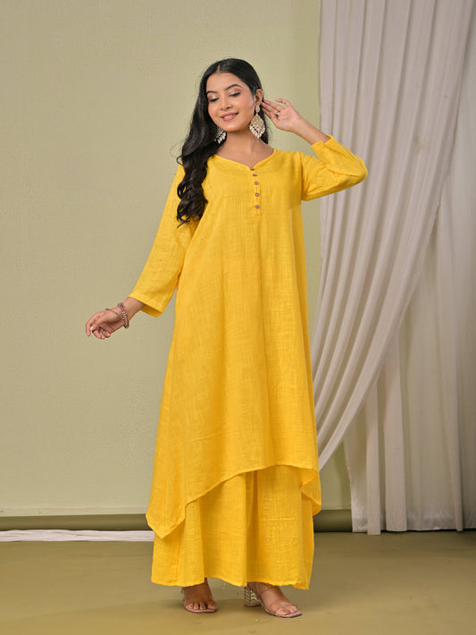 Bright Yellow pure cotton double-layer dress. It comes with a long skirt below the ankle and an asymmetric overlay dress on top. It has two pockets