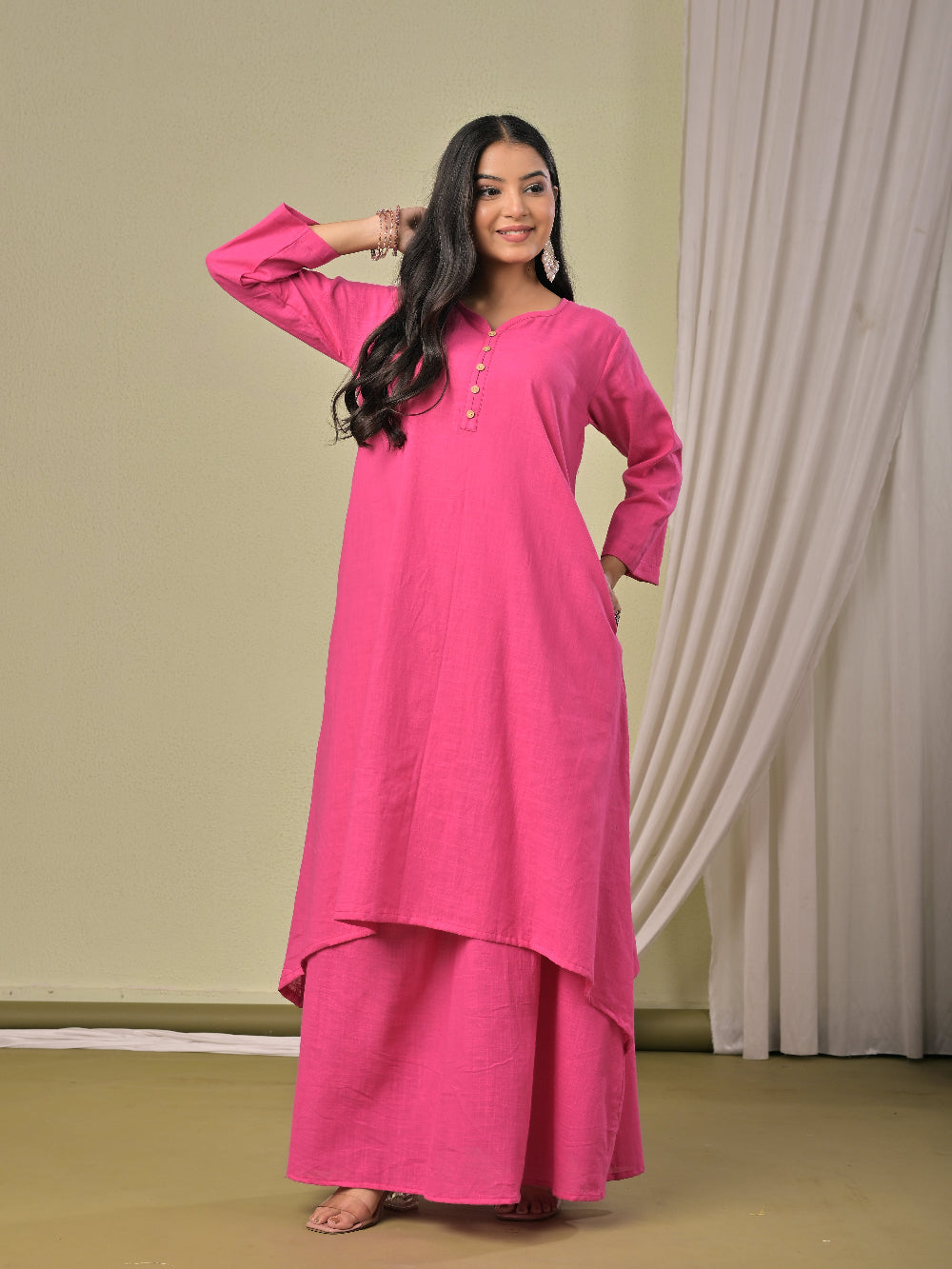 Dull Pink pure cotton double-layer dress. It comes with a long skirt below the ankle and an asymmetric overlay dress on top. It has two pockets