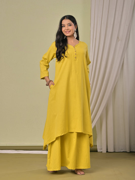 Pale Yellow pure cotton double-layer dress. It comes with a long skirt below the ankle and an asymmetric overlay dress on top. It has two pockets