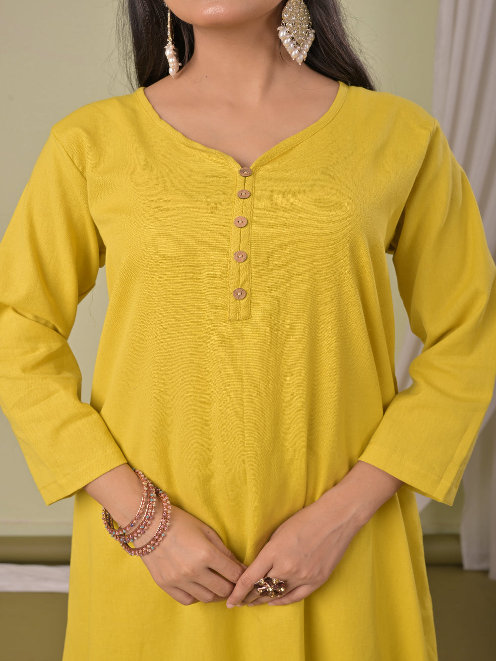 Bright Yellow pure cotton double-layer dress. It comes with a long skirt below the ankle and an asymmetric overlay dress on top. It has two pockets