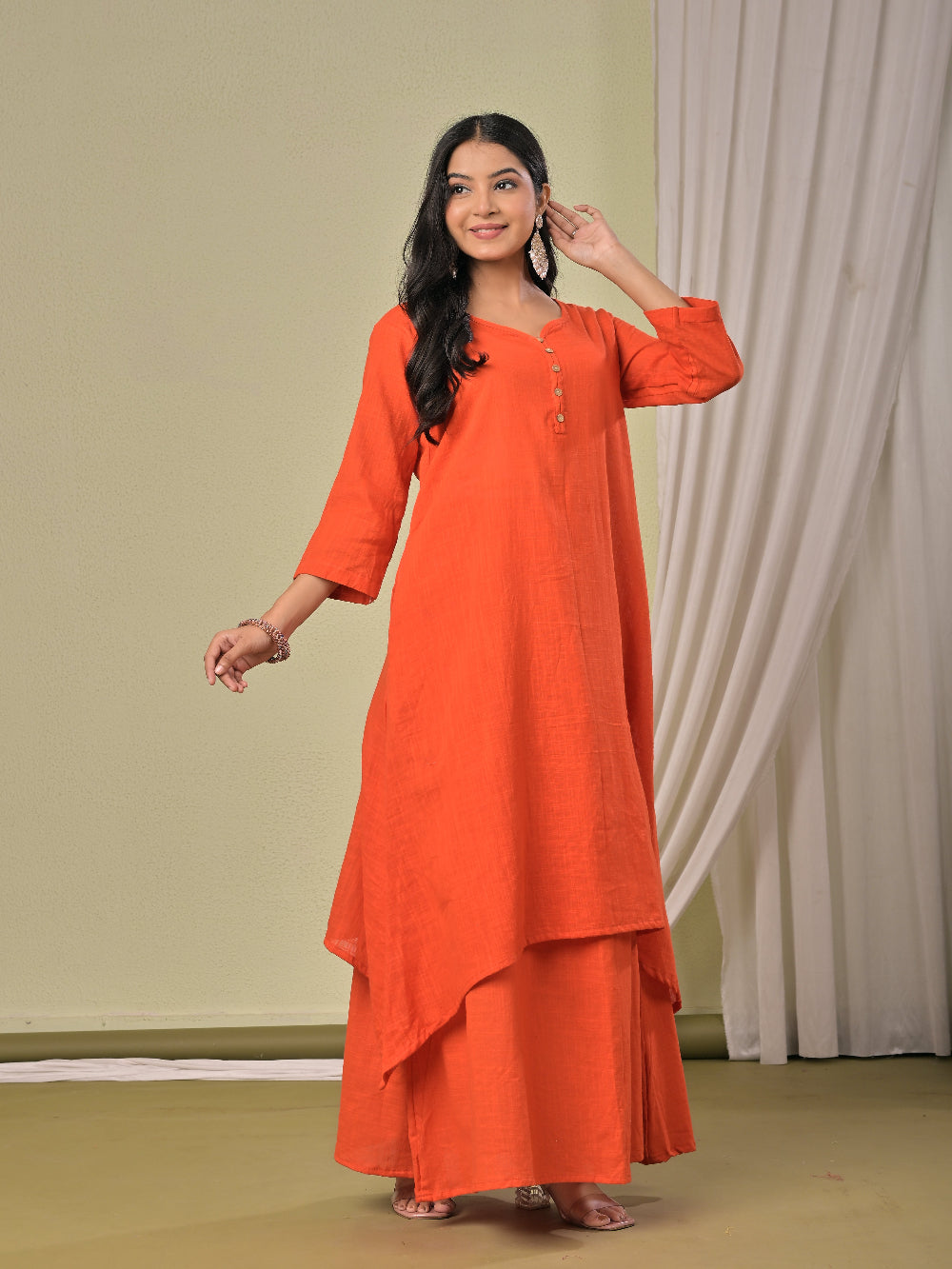 Dull Orange pure cotton double-layer dress. It comes with a long skirt below the ankle and an asymmetric overlay dress on top. It has two pockets