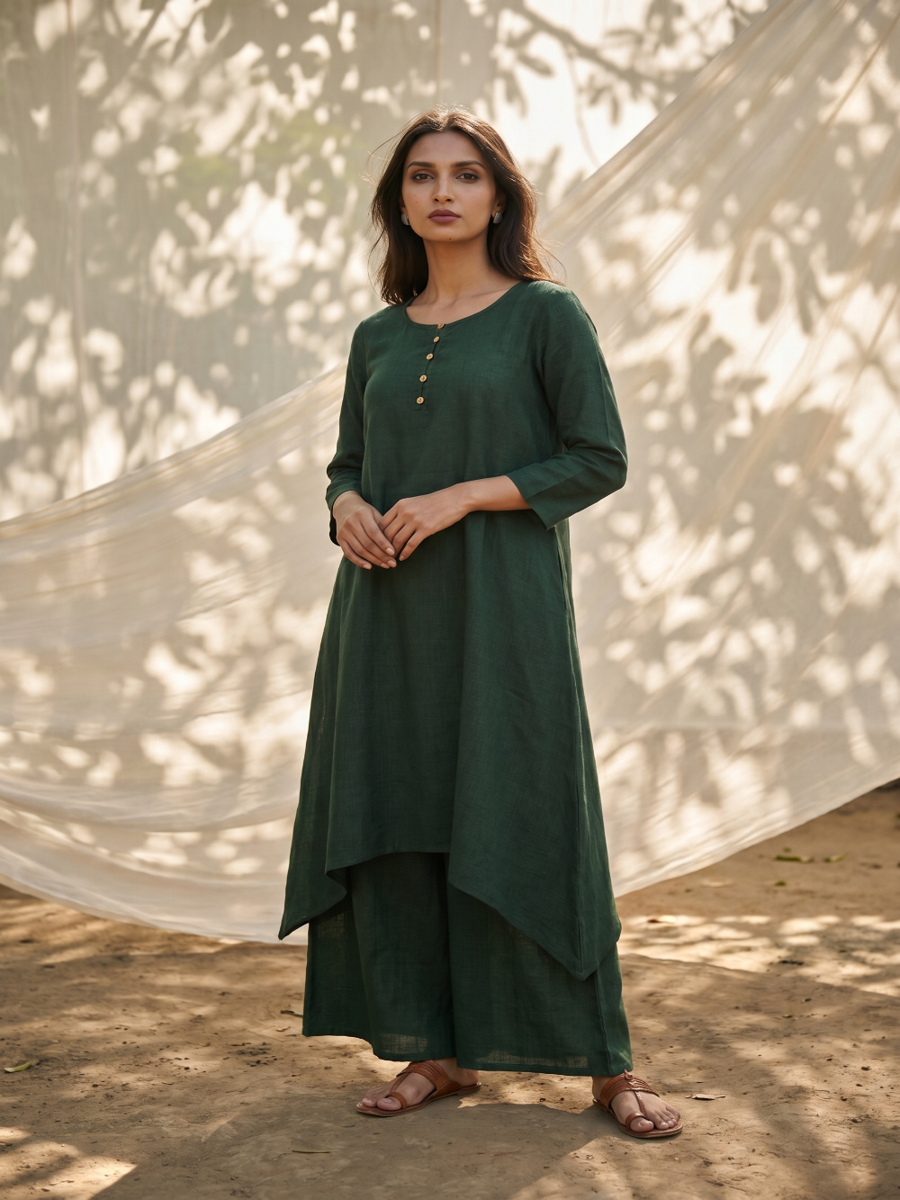 Bottle Green pure cotton double-layer dress. It comes with a long skirt below the ankle and an asymmetric overlay dress on top. It has two pockets