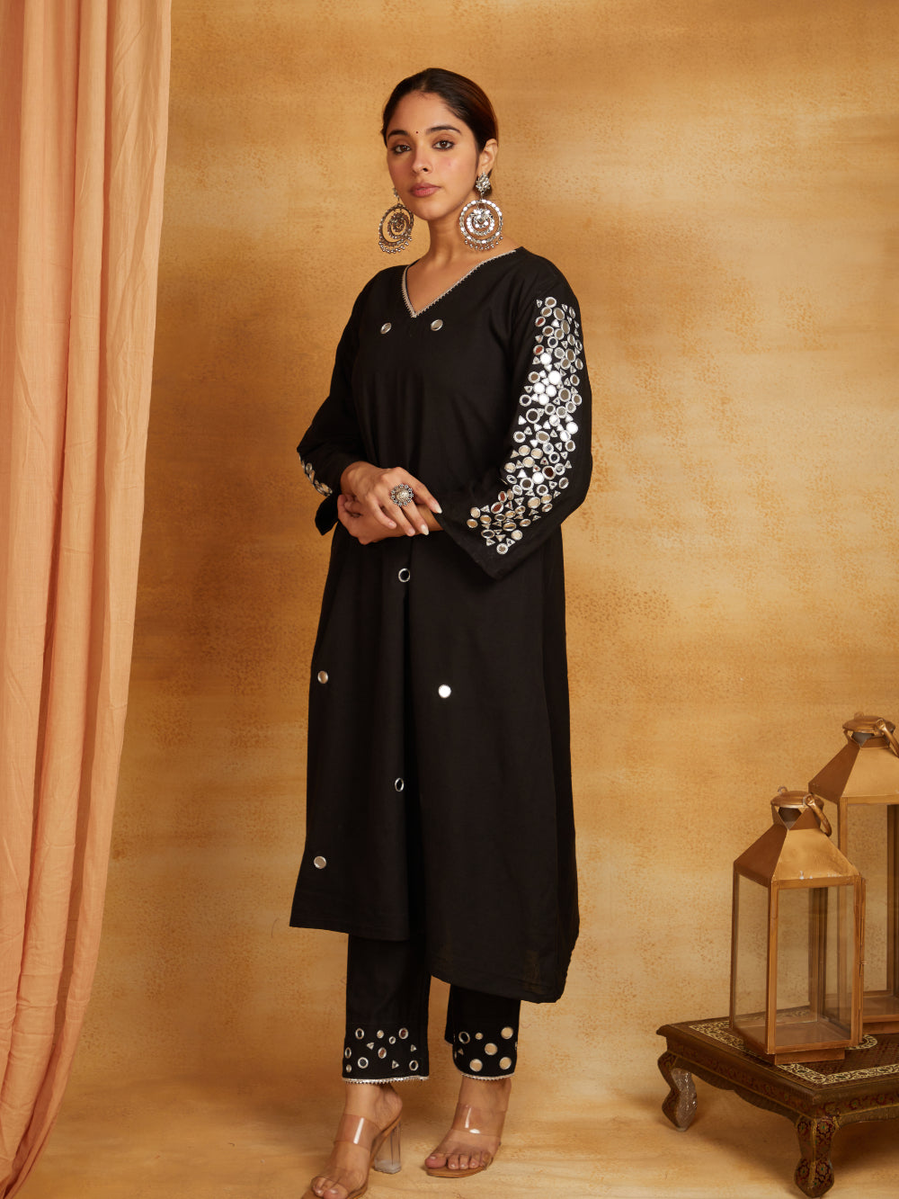 Black kurta, pant, and dupatta with mirror work