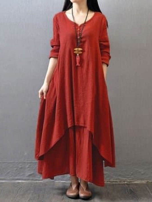 Maroon pure cotton double-layer dress. It comes with a long slip below the ankle and an asymmetric overlay dress on top. It has two pockets
