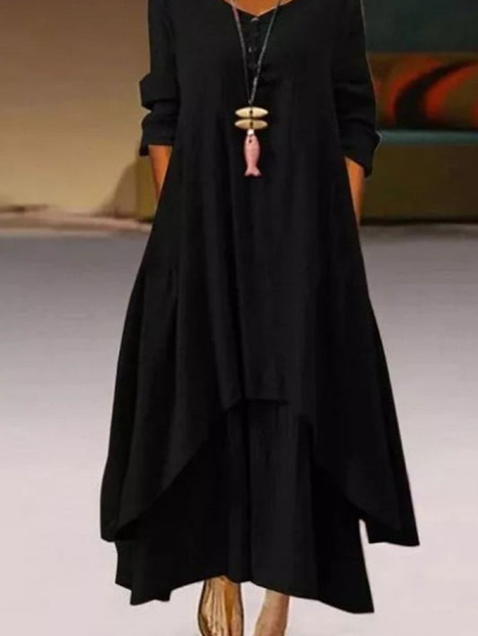Black pure cotton double-layer dress. It comes with a long slip below the ankle and an asymmetric overlay dress on top. It has two pockets