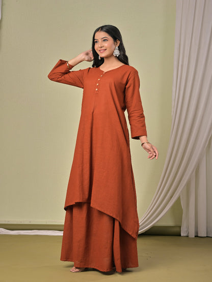 Rust Brown pure cotton double-layer dress. It comes with a long skirt below the ankle and an asymmetric overlay dress on top. It has two pockets