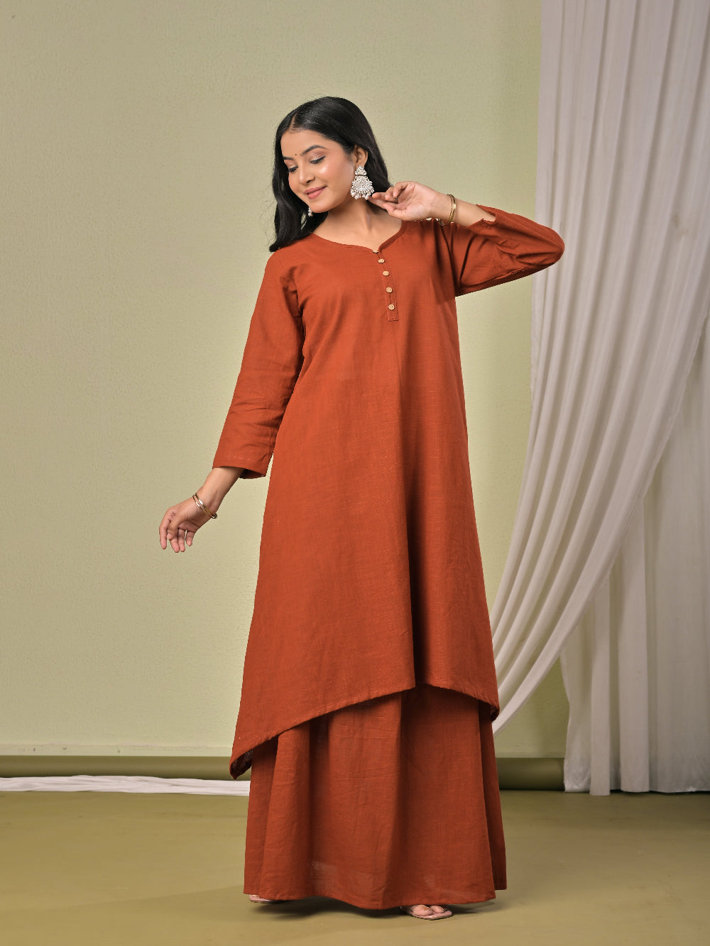 Rust Brown pure cotton double-layer dress. It comes with a long skirt below the ankle and an asymmetric overlay dress on top. It has two pockets