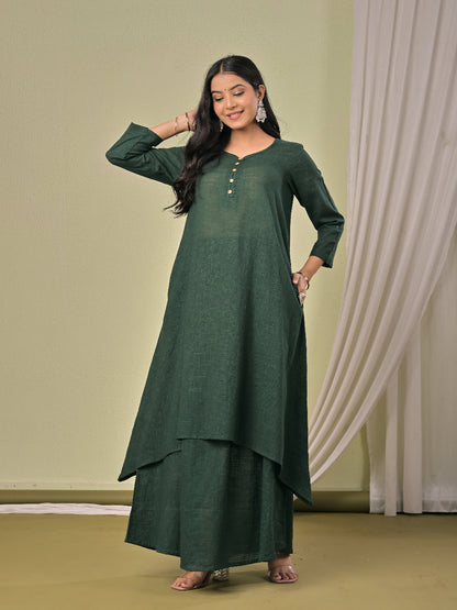 Bottle Green pure cotton double-layer dress. It comes with a long skirt below the ankle and an asymmetric overlay dress on top. It has two pockets