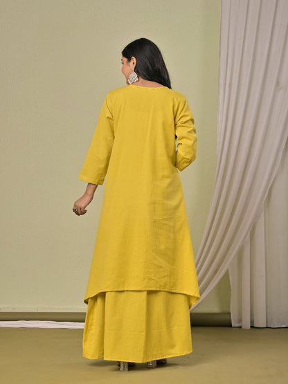 Pale Yellow  pure cotton double-layer dress. It comes with a long skirt below the ankle and an asymmetric overlay dress on top. It has two pockets