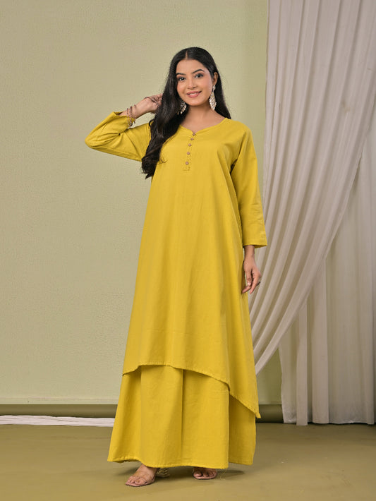 Pale Yellow  pure cotton double-layer dress. It comes with a long skirt below the ankle and an asymmetric overlay dress on top. It has two pockets