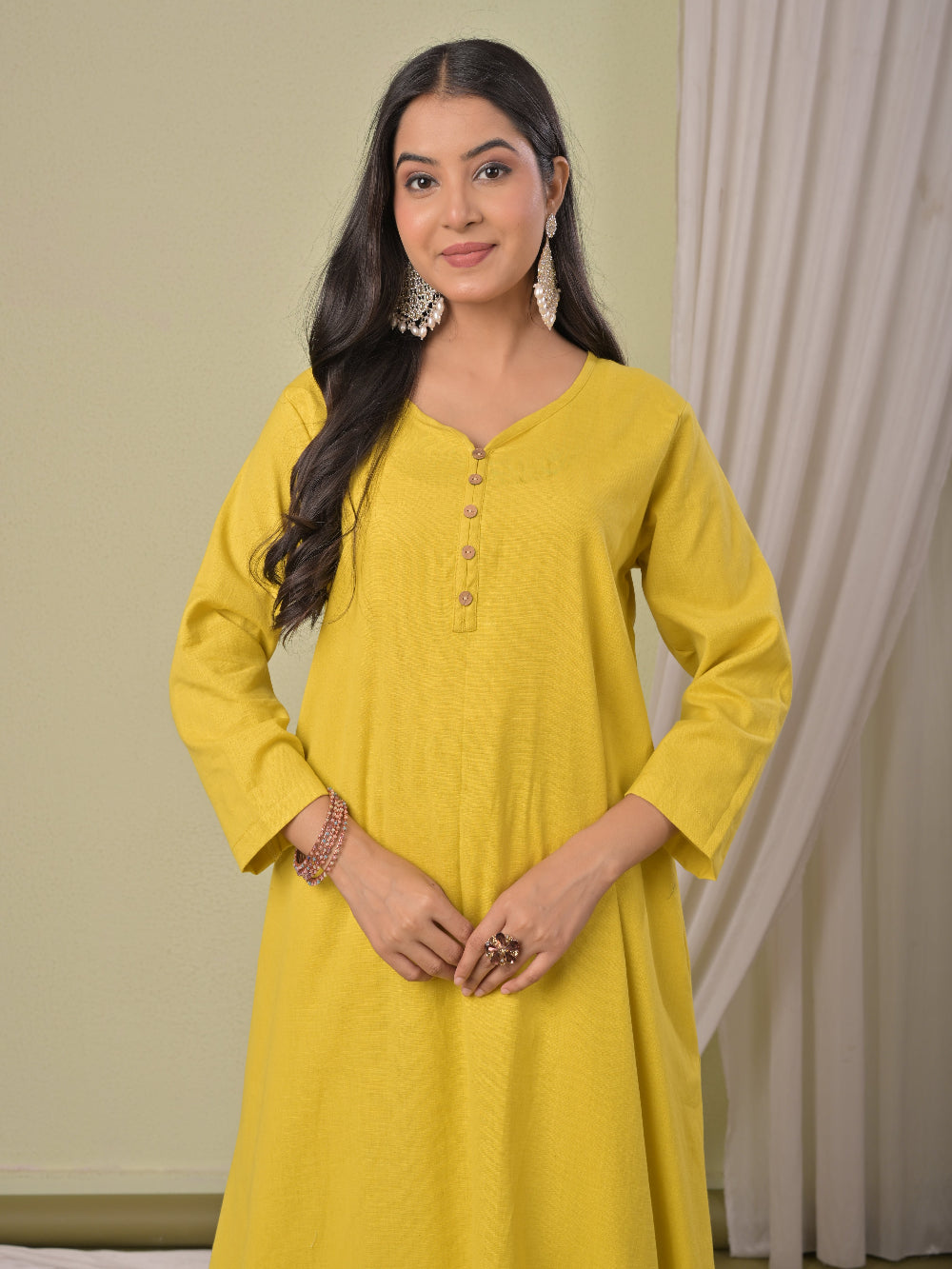 Bright Yellow pure cotton double-layer dress. It comes with a long skirt below the ankle and an asymmetric overlay dress on top. It has two pockets