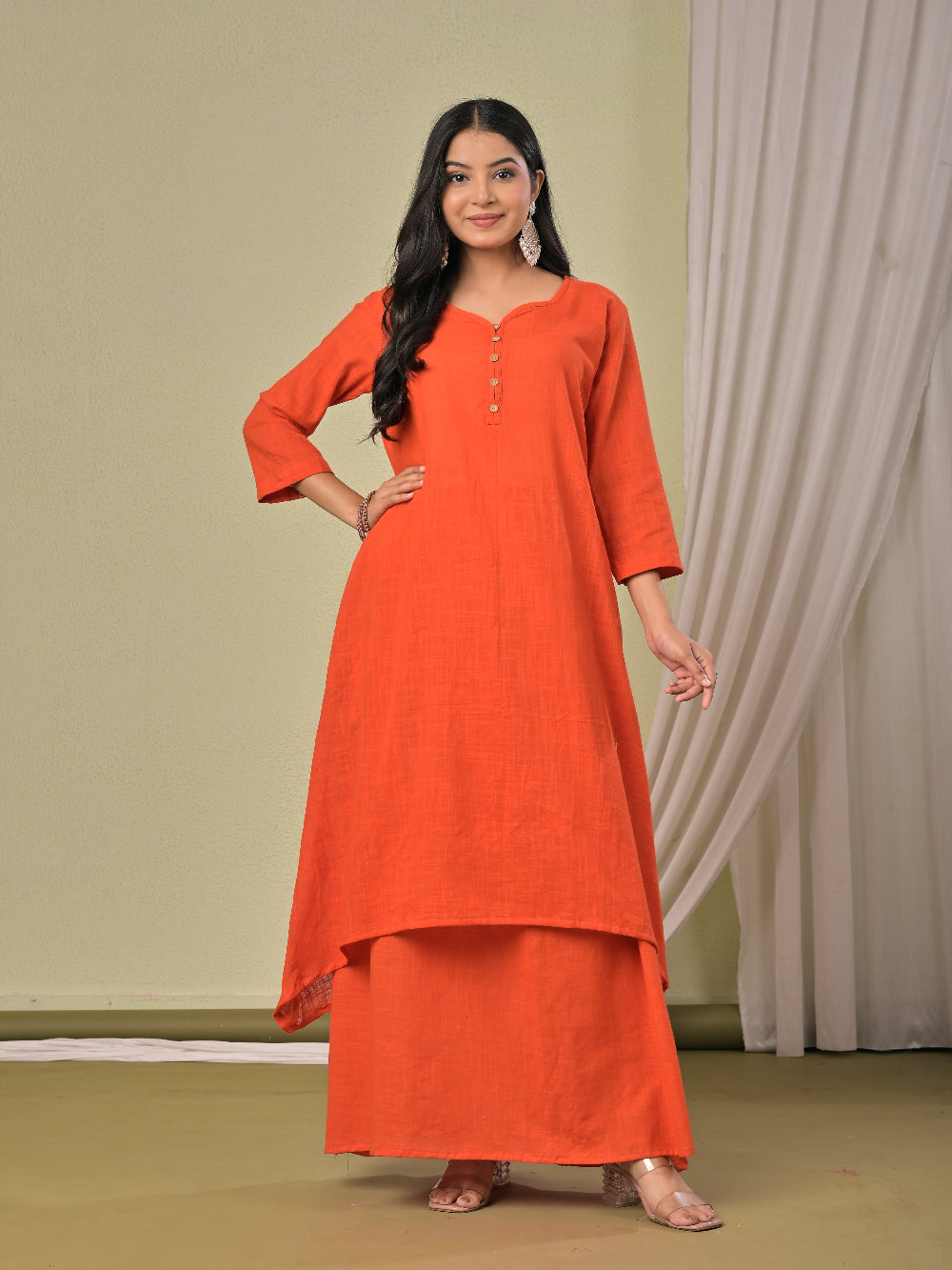 Dull Orange pure cotton double-layer dress. It comes with a long skirt below the ankle and an asymmetric overlay dress on top. It has two pockets