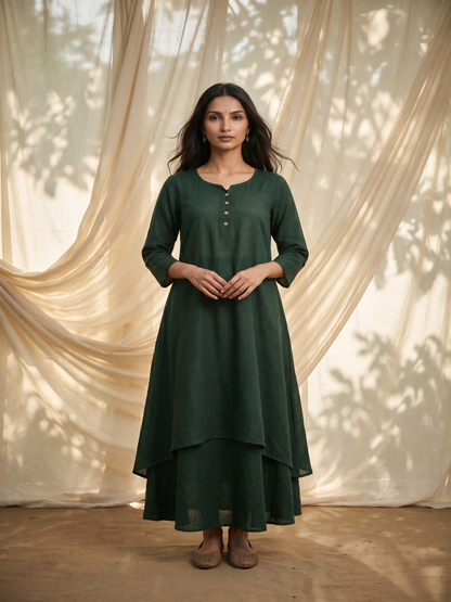 Bottle Green pure cotton double-layer dress. It comes with a long skirt below the ankle and an asymmetric overlay dress on top. It has two pockets