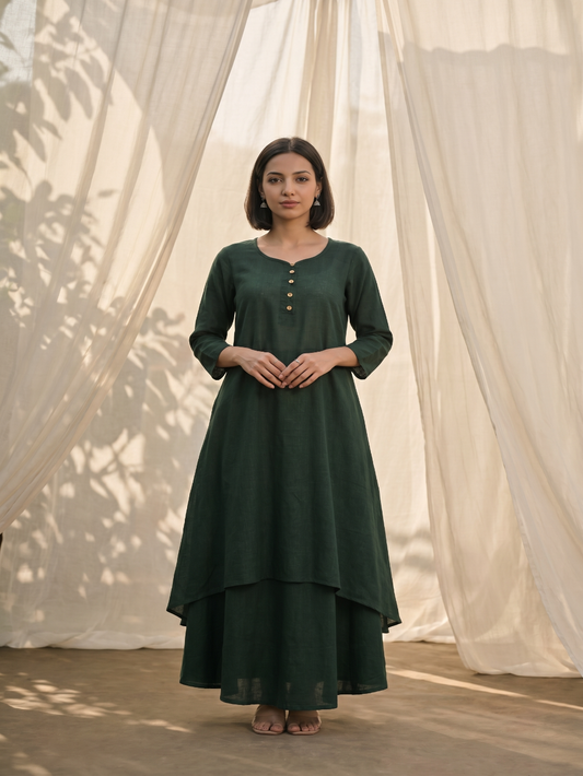 Bottle Green pure cotton double-layer dress. It comes with a long skirt below the ankle and an asymmetric overlay dress on top. It has two pockets