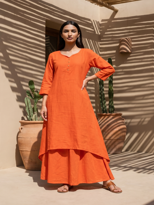 Dull Orange pure cotton double-layer dress. It comes with a long skirt below the ankle and an asymmetric overlay dress on top. It has two pockets